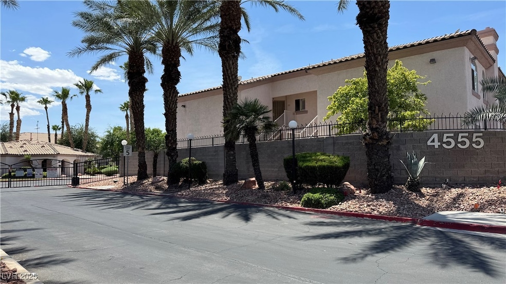 View of side of home featuring stucco siding and a