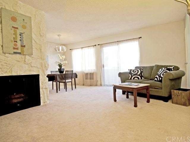 Living Room has new carpet and new paint.