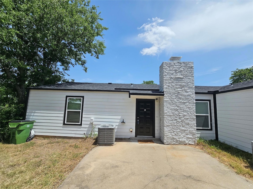 View of front of house with a patio area and a ch