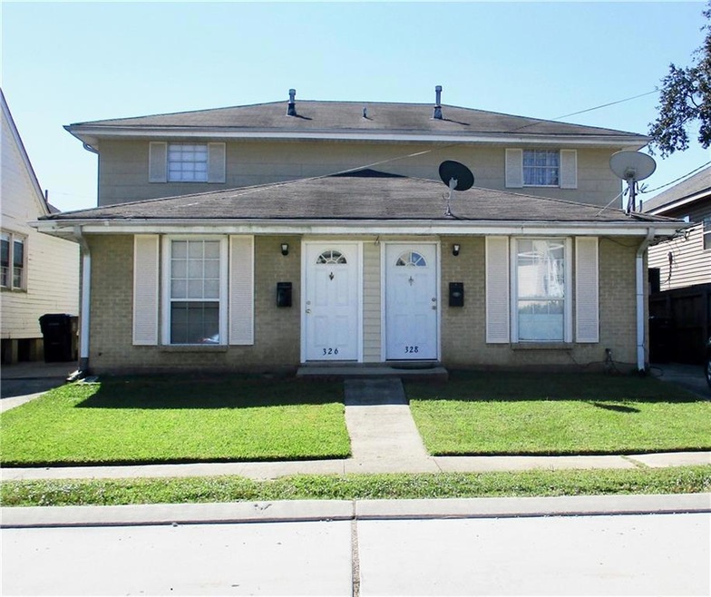 Front view.  Each side has it's own driveway & fen