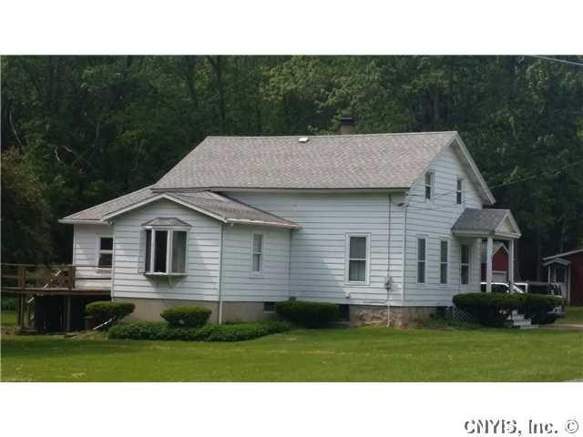 Exterior Front South-facing addition w/picture win