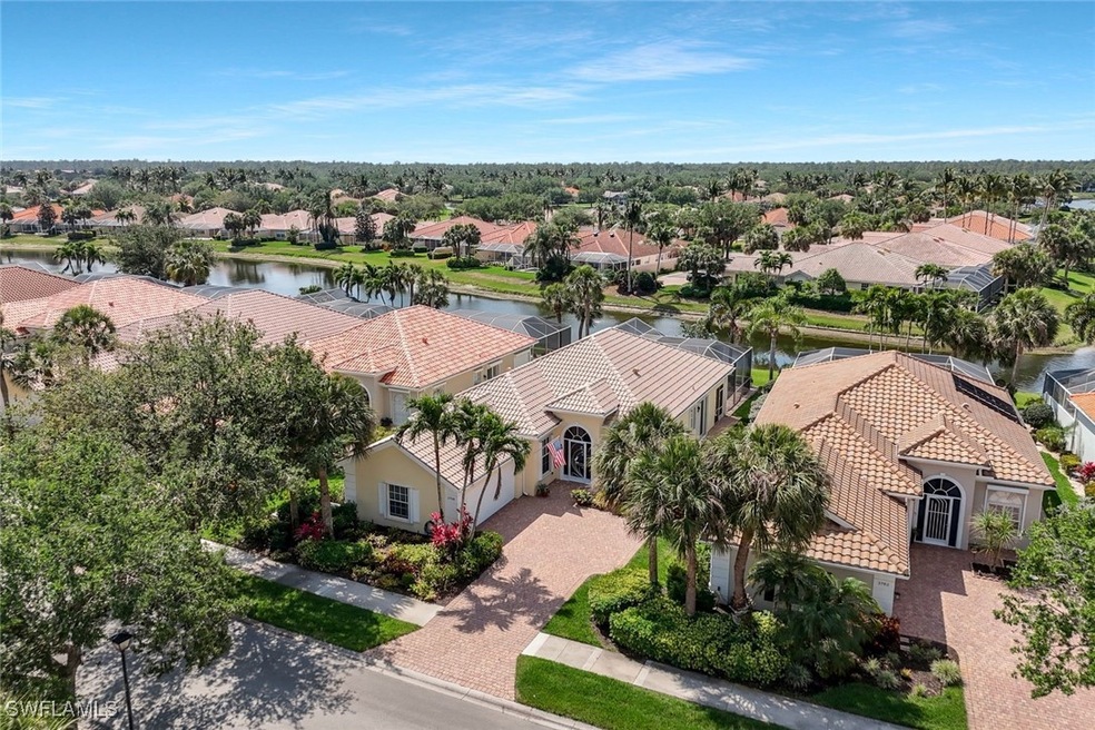 Birds eye view of property featuring a residential view and a water view