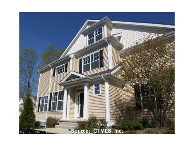 Exterior Front. Attractive exterior. End unit.