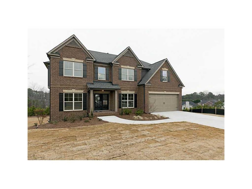 Exterior Front. Gorgeous 4 side brick home on a fu