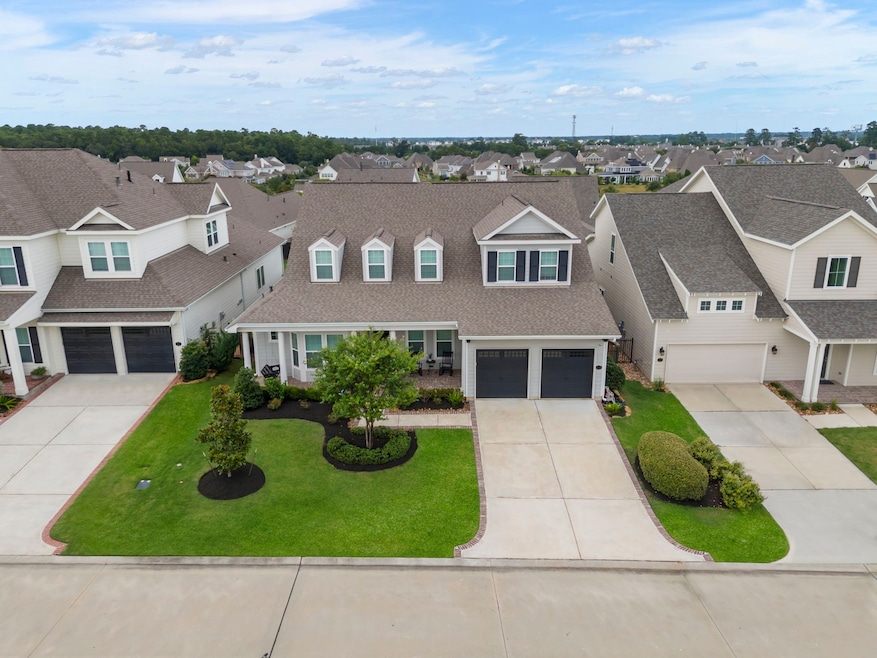 Welcome to 2225 Salt Grass, in the peaceful community of Stillwater in Conroe, TX!