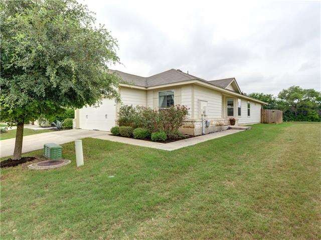 Spacious side yard with private side entry front d