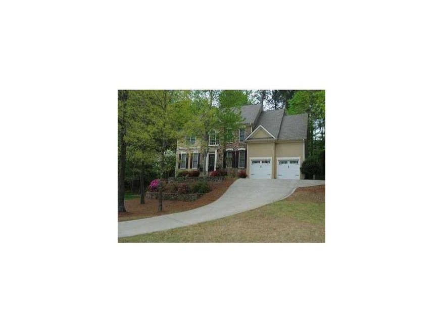 Exterior Front. Stacked Stone Beauty on large wood