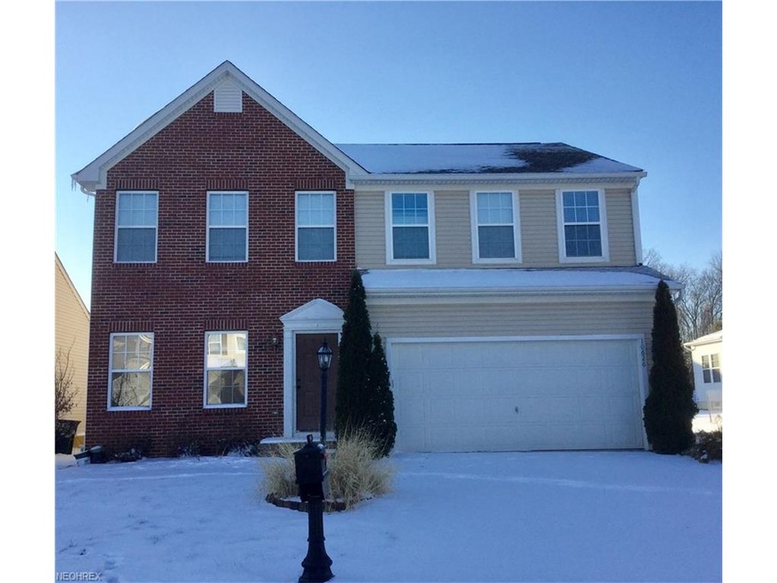 East facing, brick front, attached 2 car garage