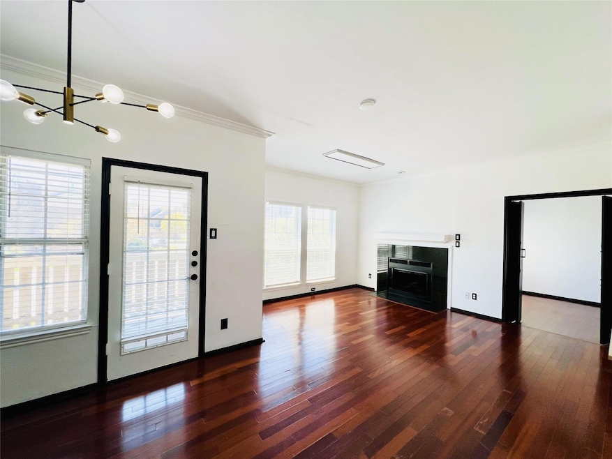 living room featuring a wealth of natural light, a