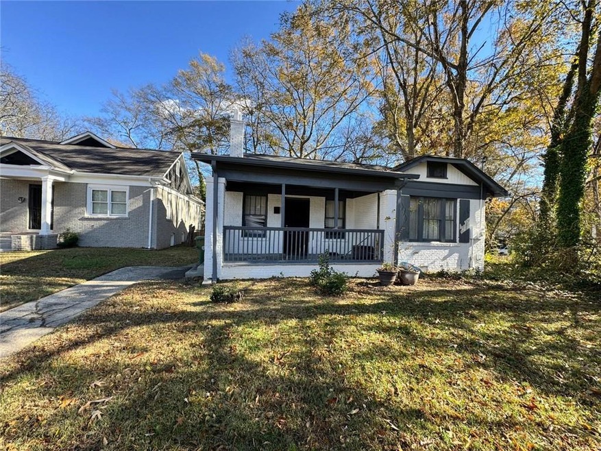 View of front of house featuring a porch and a fro