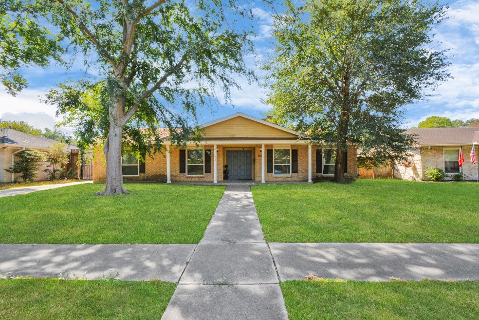 Beautiful four bedroom home mature trees and great curb appeal.