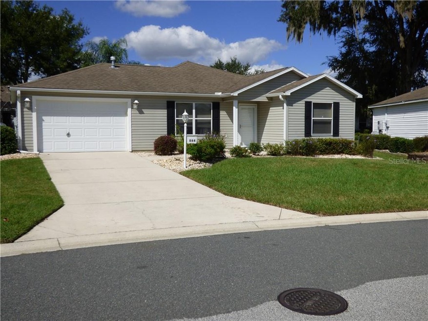 864 Evelynton Loop, The Villages, FL 32162 - photo 1