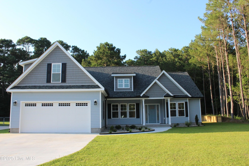 Front of house June 26