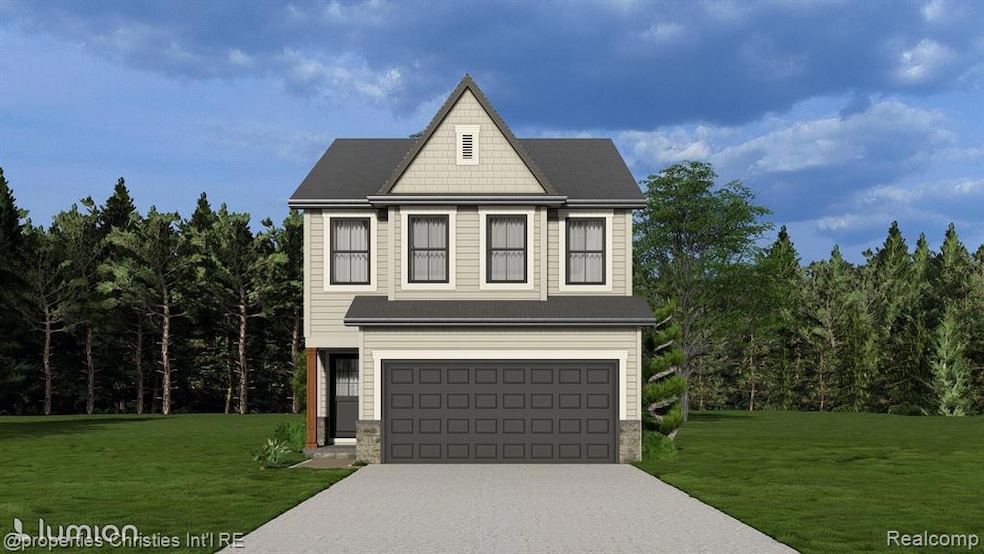 View of front of home with a front lawn, driveway, an attached garage, and stone siding