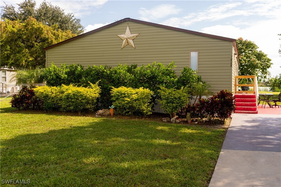 View of home's exterior featuring a lawn