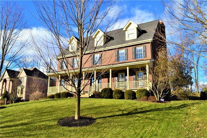 Beautiful Brick Home with covered front porch span