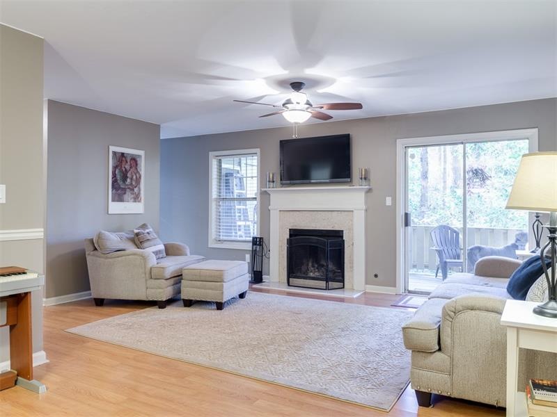 Living room with gas fireplace, new Pergo floor an