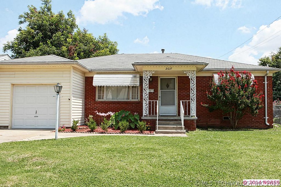 Darling midtown cottage with great curb appeal
