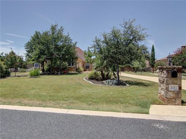 Attractive Front yard - home sits on a full acre