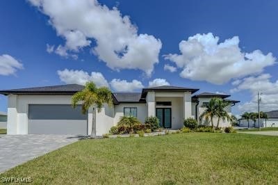View of front of property featuring a front yard a