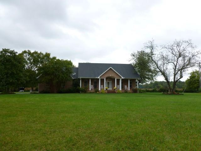 Beautiful, brick home in Manchester with acreage! 