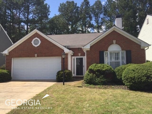 Brick front One level living on flat lot.  Cement 