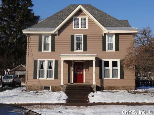 Exterior Front Sunny Southern corner lot offers wo