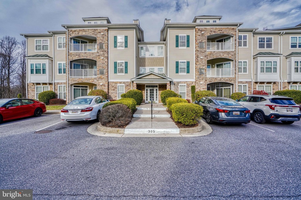 305 Wyndham Cir unit L, Owings Mills, MD 21117 - photo 1
