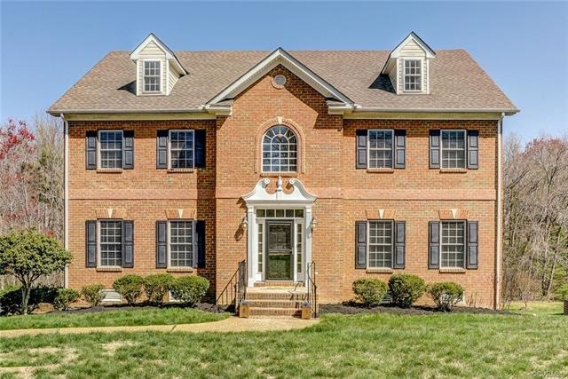 Gorgeous 3-sided brick home with finished basement