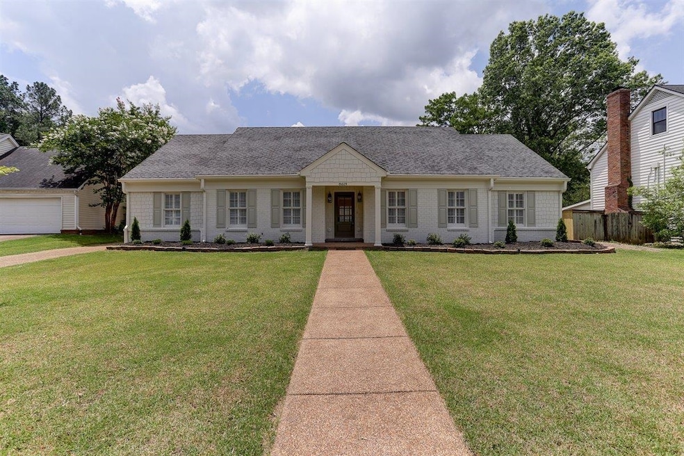 View of front of property featuring roof with shingles