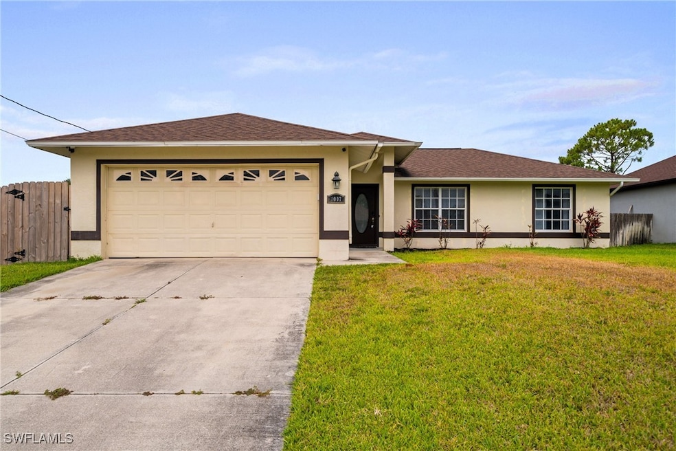 Ranch-style house featuring stucco siding, concret