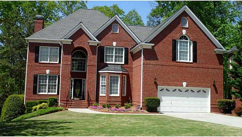 Exterior Front. Elegant Brick Home with Basement o