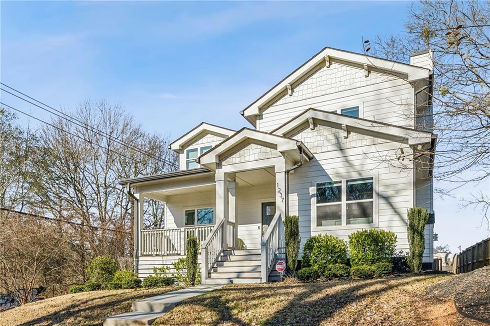 View of front of home featuring covered porch