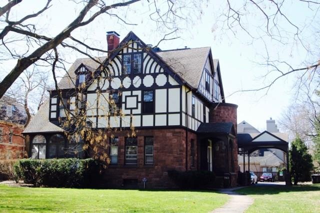 Stately Tudor with Carport