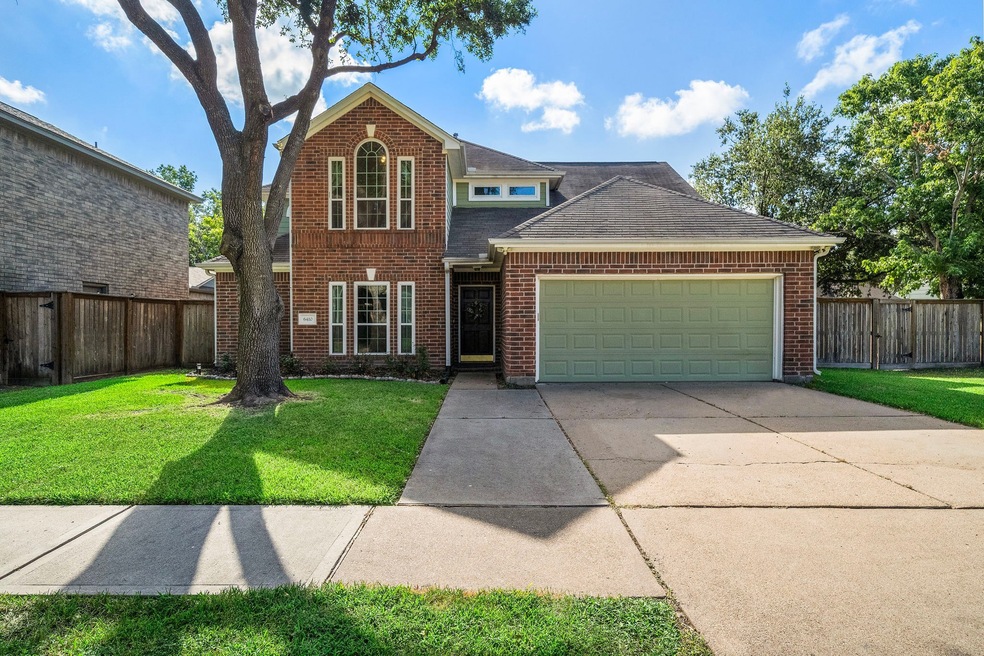Welcome to this inviting brick-style home in the B
