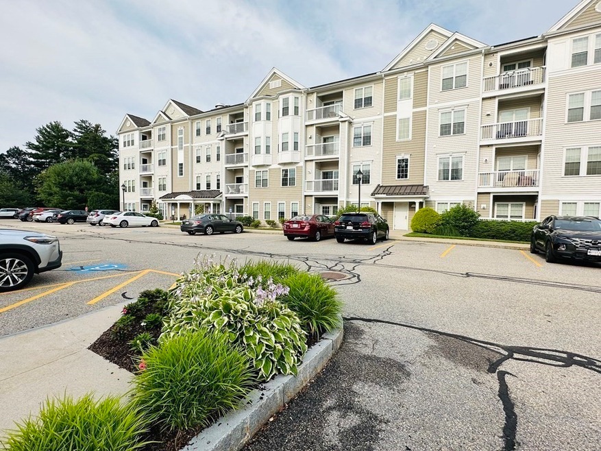 Wellington Crossing unit 202, Waltham, MA 02452 - photo 1
