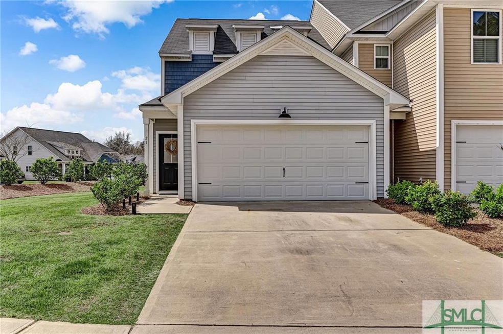 21 Bellasera Way in The Commons. This townhome has