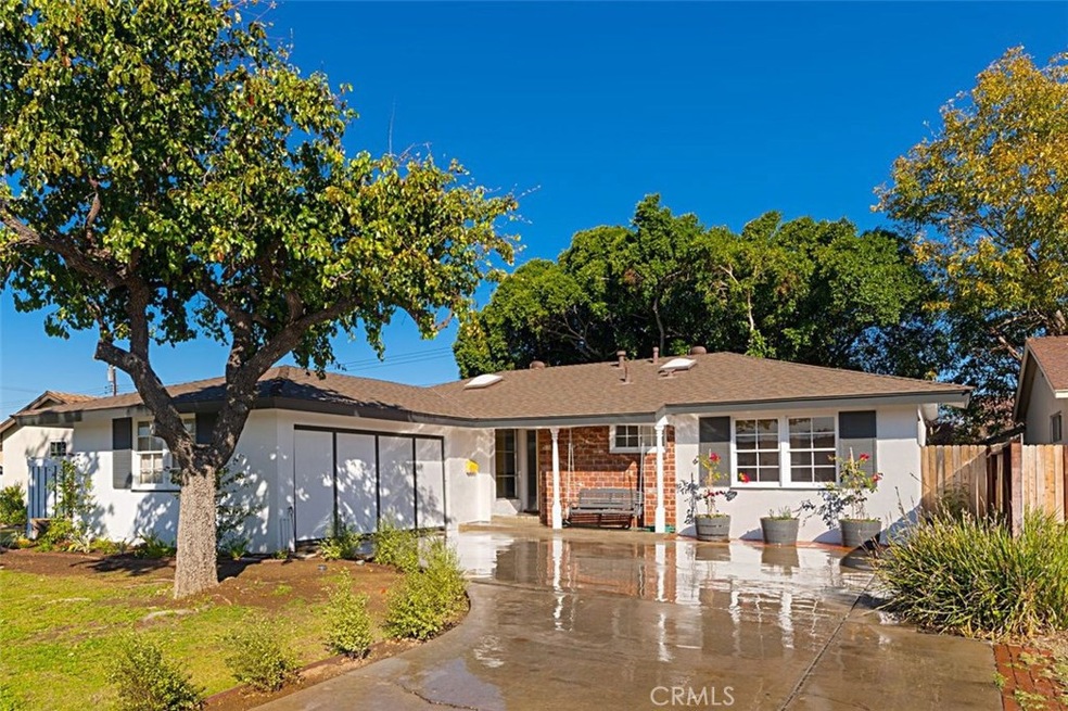 Large Driveway with a more private entrance to the Garage.