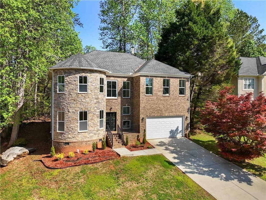 Elegant stone and brick front with ample size front porch