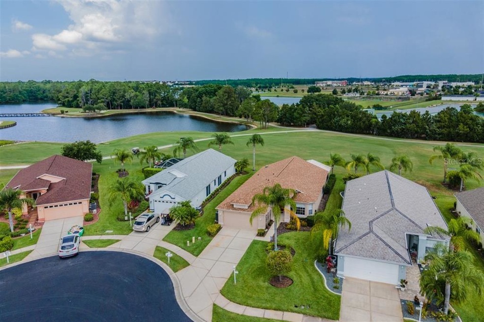 Golf and pond views in a quiet cul-de-sac