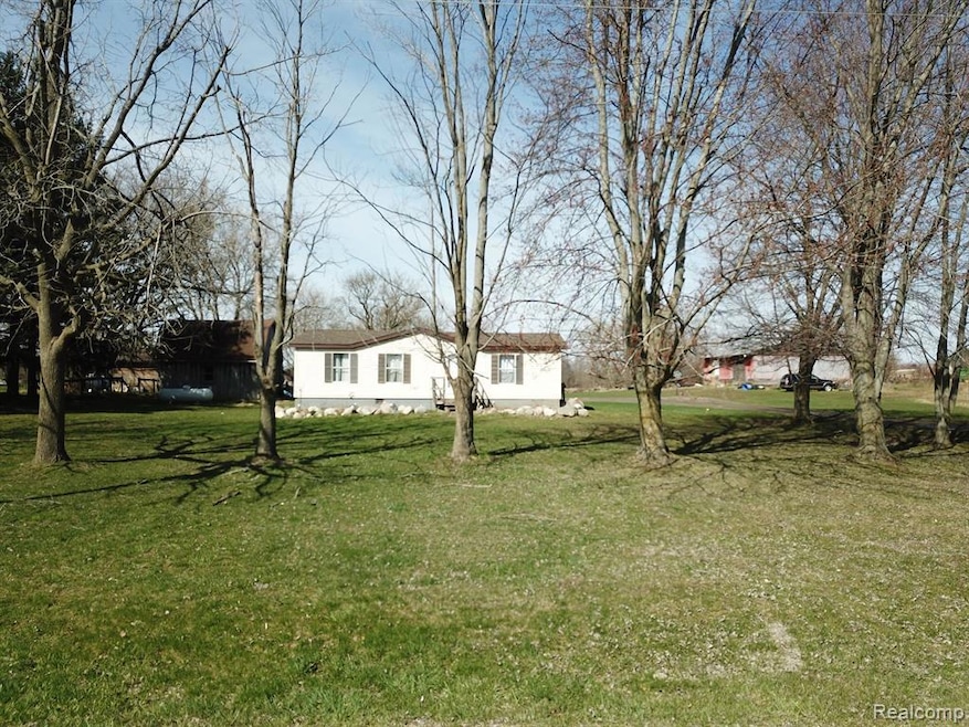 9697 Marsh Rd, Fowlerville, MI 48836 - photo 1