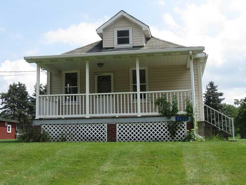 Exterior Front. A charming cottage located across 