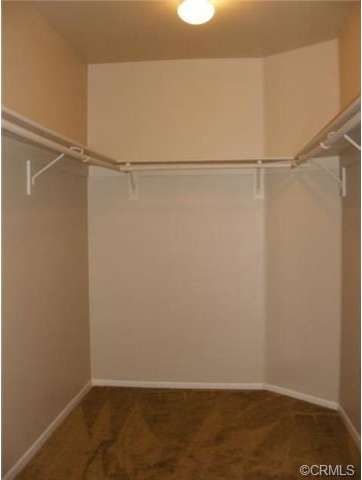 Master bedroom walk in closet. 