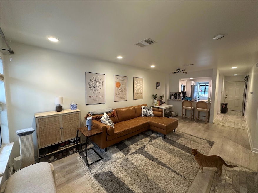 Living room featuring recessed lighting, visible 