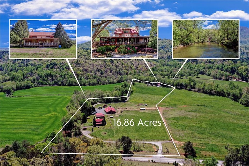 Birds eye view of property with a rural view