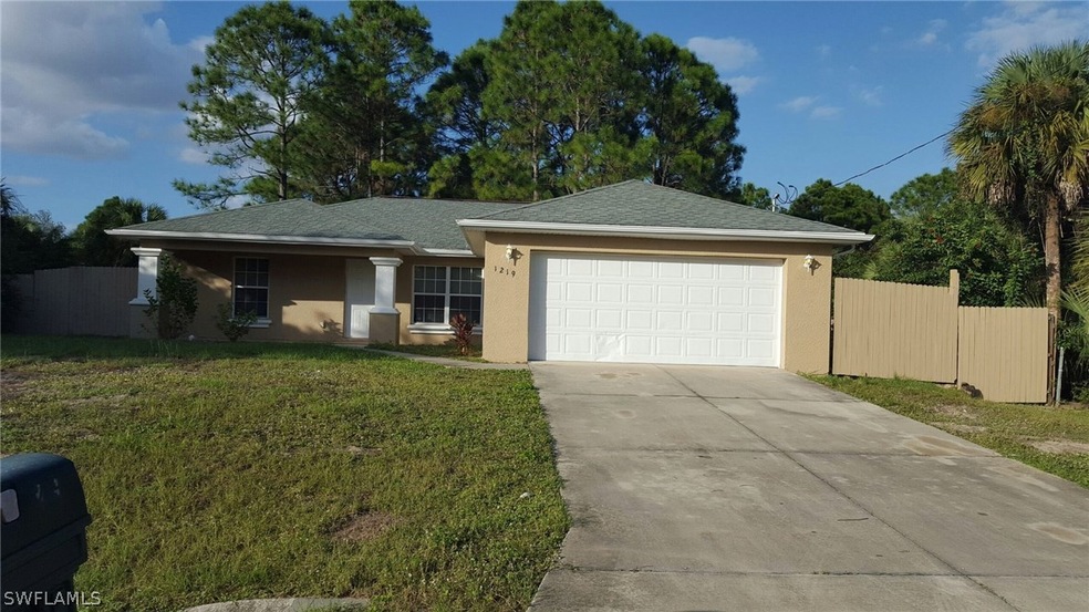 1219 Howell St E, Lehigh Acres, FL 33974 - photo 1