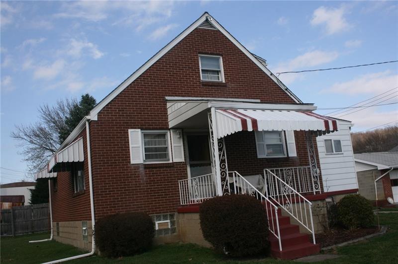 WELL LOVED CAPE COD WITH ROCKING CHAIR FRONT PORCH