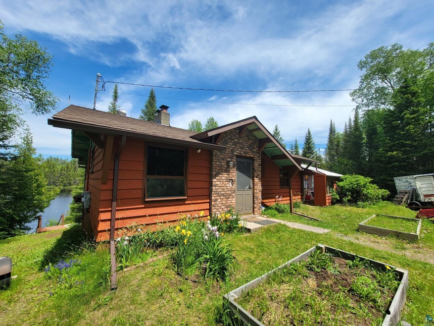 View of front of house with a front yard