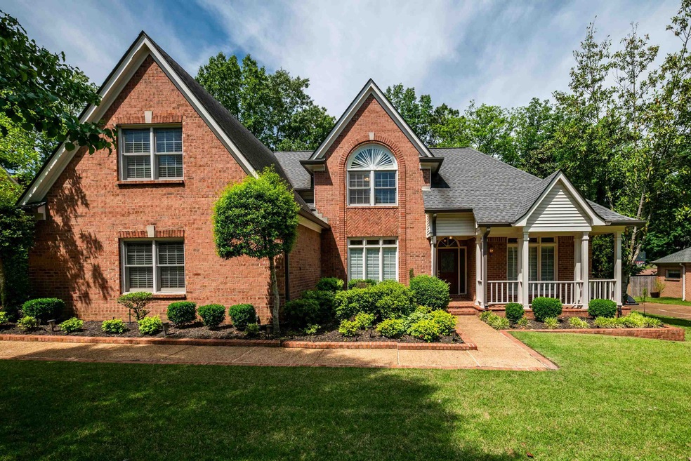 Nice brick traditional with front porch, irrigatio