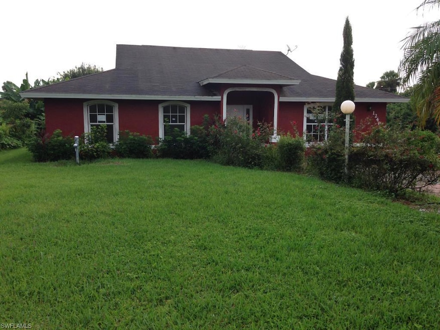 1240 13th St SW, Naples, FL 34117 - photo 1